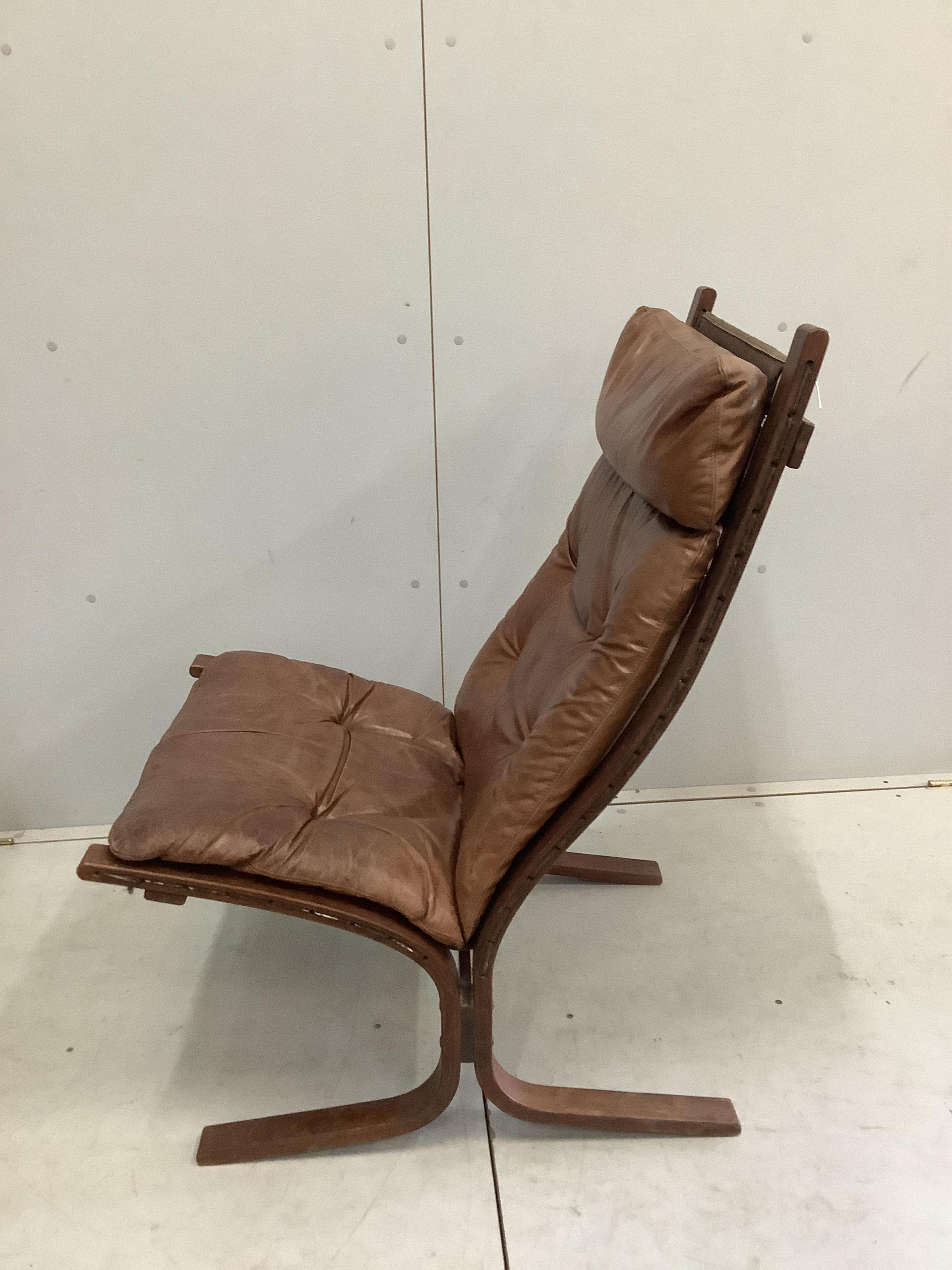 An Ingmar Relling leather chair, width 62cm, depth 66cm, height 98cm and footstool, Siesta